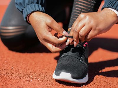 Close up of sports shoes on a running track.